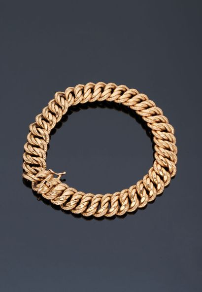 null Bracelet gourmette en or jaune 18 k (750 millièmes).

Poids : 18.9 g - Longueur...