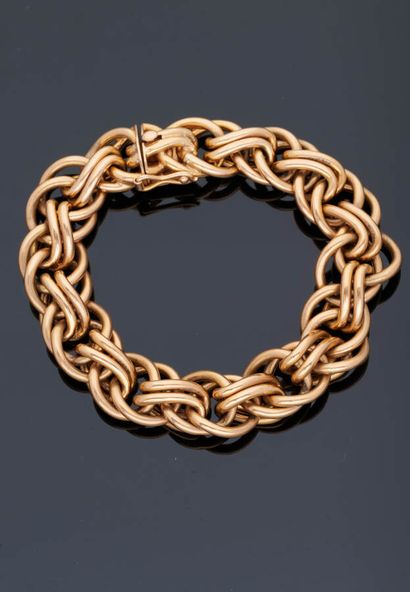 null MAUBOUSSIN Paris - Bracelet gourmette en or jaune 18 k (750 millièmes).

Signé...