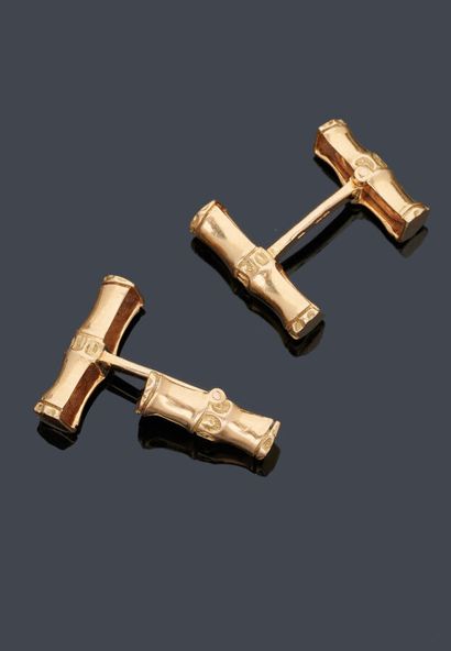 null Pair of cufflinks in 18 k yellow gold (750 thousandths) with bamboo pattern.

French...