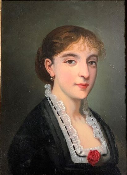 null Ecole du XIXe siècle

Portait de femme à la robe noire ornée d'une rose rouge.

Huile...