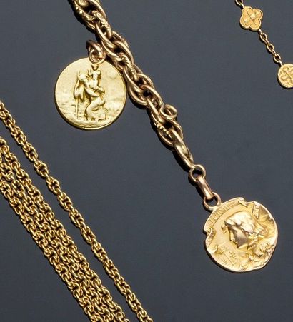 null Bracelet gourmette en or jaune 18 k (750 millièmes) ornée de deux médailles.

Poids...