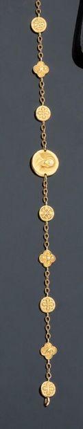 null Bracelet en or jaune 18 k (750 millièmes) orné de médailles religieuses dont...