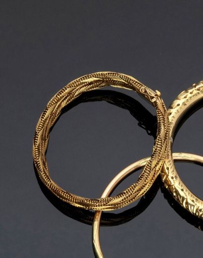 Bracelet articulé en or jaune 18 k (750 millièmes)...