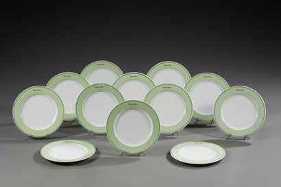 null Hutschenreuther. Twelve round plates in white porcelain. The enamelled border...