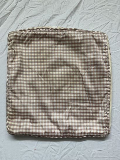 null A pair of square cushion covers in green and white checkered canvas. Piped finish,...