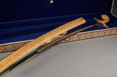 null Set including : 

- Djambiya dagger from Saudi Arabia. 

Gilt metal with leafy...
