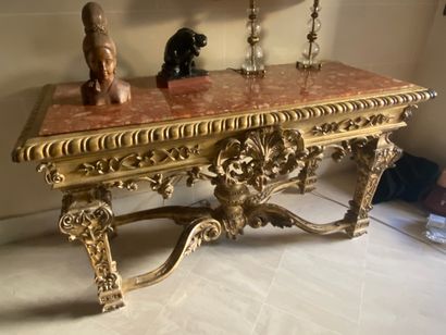 null 
Console in wood and carved and gilded medium resting on four feet joined by...