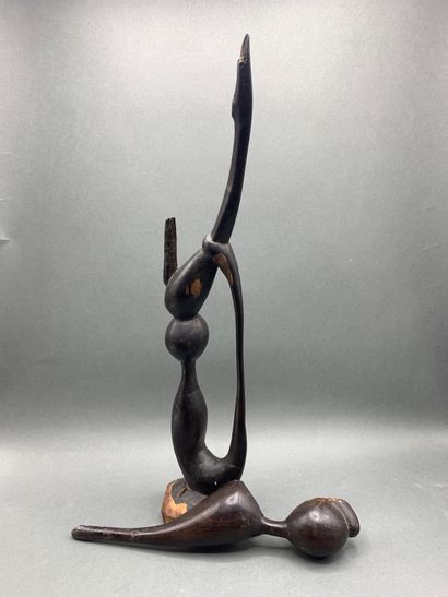 null 
Figurine en bois exotique Makomde. (Accidenté)

Hauteur : 40 cm
