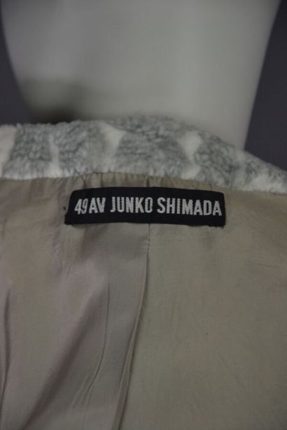 null Ensemble JUNKO SHIMADA - Années 90

L'ensemble est taillé en fausse fourrure...