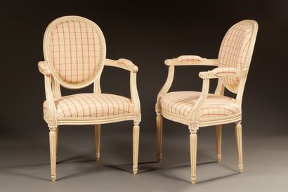 null Pair of Louis XVI style cabriolet armchairs in cream lacquered wood. Medallion...