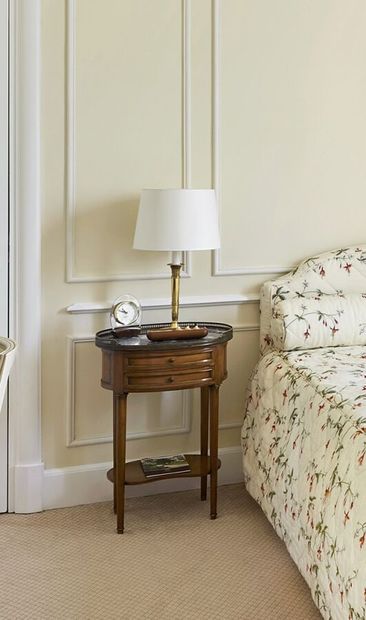 null Pair of oval bedside tables in the Louis XVI style in cherry wood and brass...
