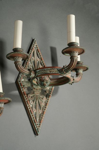 null Pair of large antique style sconces with three arms of lights in patinated bronze....