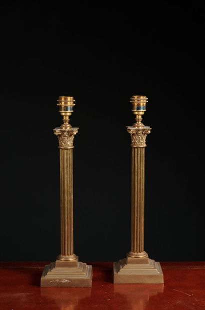 null Vaughan designs. Pair of fluted brass column lamps with Corinthian capitals.
Height...