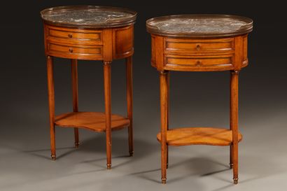 null Pair of oval bedside tables in the Louis XVI style in cherry wood and brass...