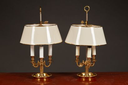 null Pair of brass bouillotte lamps with three arms of lights. Lampshade in cream...