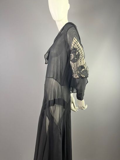 null Robe du soir en dentelle et mousseline noire - Années 1930
Le modèle est taillé...
