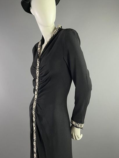 null BRUYÈRE Paris Black embroidered long dress. Middle of the 40's

The model is...