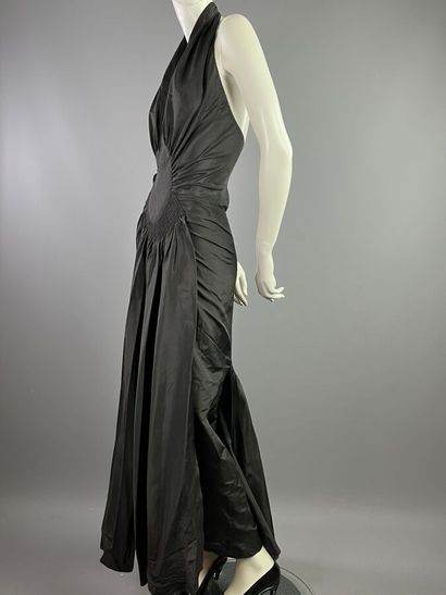 null CHANEL Black silk faille halter dress - Early 30s

The model is made in a black...