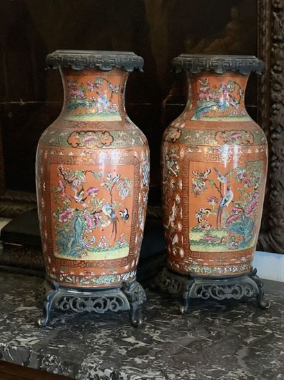 null Pair of Canton porcelain vases with coral background and polychrome decoration...