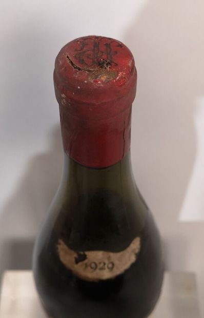 null 1 bouteille CHAMBERTIN - L. PORET 1929 Etiquette tachée et abîmée. Niveau 6...