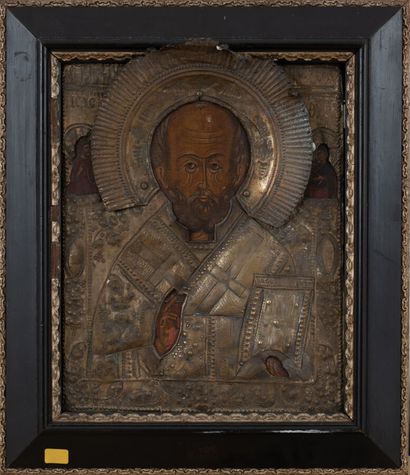 null Russian woodcut icon of Saint Nicholas, metal riza.
19th century
26.5 x 21 cm
Wear,...
