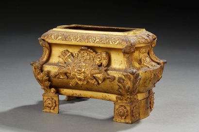 Gilt bronze chenet base supporting a plaster...