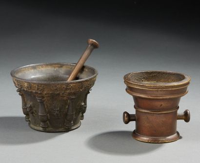 Two bronze mortars decorated with alternating...