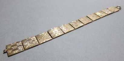 null BRACELET en or jaune 14k (585 millièmes) composé de onze plaques articulées,...