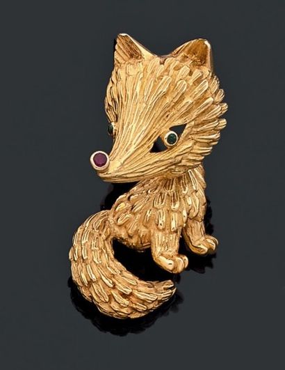 null BROCHE renard en or jaune 18k (750 millièmes) les yeux sertis de petites émeraudes...