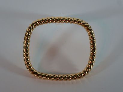 null Bracelet jonc ouvrant en or jaune 18k (750 millièmes) torsadé de forme légèrement...