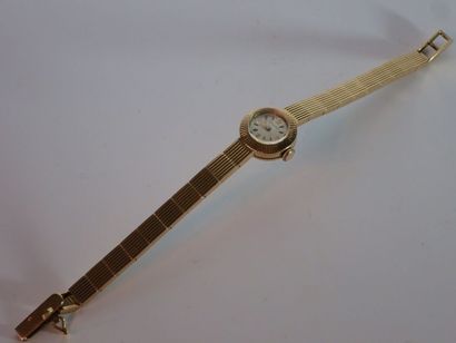 MOVADO Montre de dame en or jaune 18k (750 millièmes), bracelet articulé en or à...