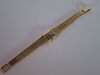 BAUME & MERCIER Montre bracelet de dame en or jaune 18k (750 millièmes), bracelet...