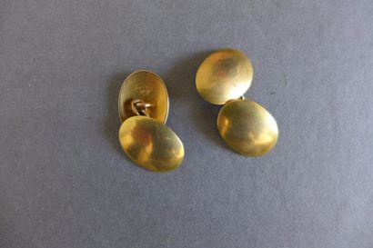 null Paire de boutons de manchette en or jaune 18 k (750 millièmes) à décor d'une...