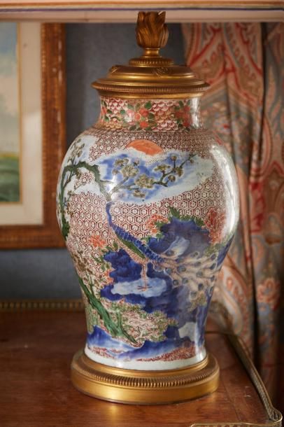 null ESCALIER DE CRISTAL

Vase en porcelaine de Chine à décor polychrome dans le...