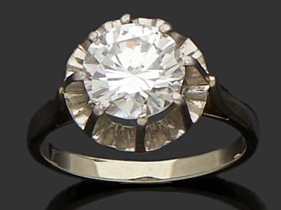 null BAGUE solitaire en platine et or gris 18 k (750 millièmes) sertie d'un diamant...