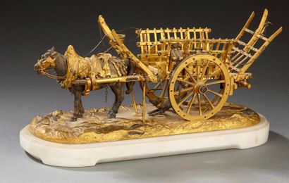 null Sculpture en bronze doré et patiné représentant une charrette tirée par un cheval,...