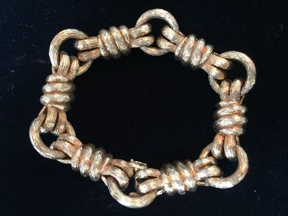 null Bracelet "noeuds" en or jaune 18 k (750 millièmes) les mailles en forme de cordages...