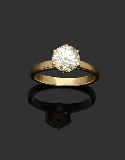 null Bague solitaire en or jaune 18 k (750 millièmes) sertie d'un diamant de taille...