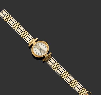 null BAUME & MERCIER

Montre bracelet de dame en or jaune et gris 18 k (750 millièmes)...