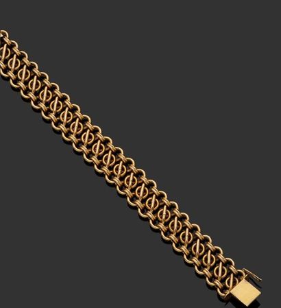 null Bracelet gourmette en or jaune 18 k (750 millièmes) à décor ajouré entrelacé.

Poids...