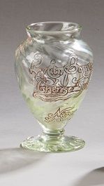 null Emile GALLE (1846 - 1904)

Vase ovoide en verre soufflé à côtes torses, gravé...