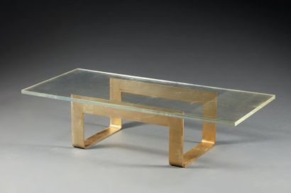 null Table basse en bronze ou laiton de forme libre, plateau en plexiglass.

Circa...
