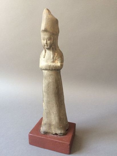 null CHINE - Epoque TANG (618-907)

Statuette de dame de cour en terre cuite, debout,...