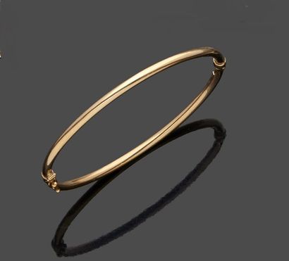 null Bracelet jonc rigide en or jaune 9 k (375 millièmes) ouverture à charnière et...