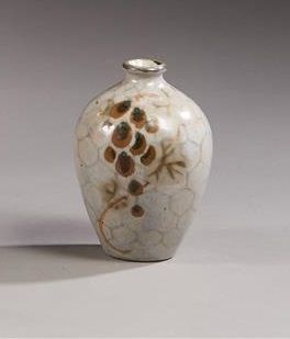null Georges SERRE (1889-1956)
Petit vase en grès à décor d'hexagones tacheté noir...