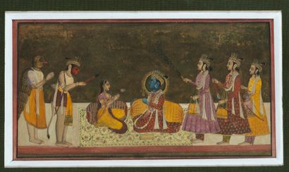 ﻿Krishna et une jeune femme entourés 
de...