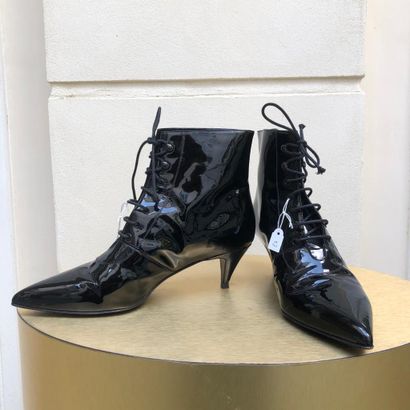 27. Saint Laurent 
Pair of small heels boots,...