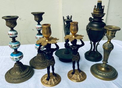 Lot composed of two pairs of torches, a candlestick,...