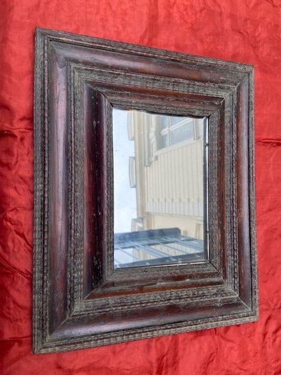 Rectangular frame in natural wood decorated...