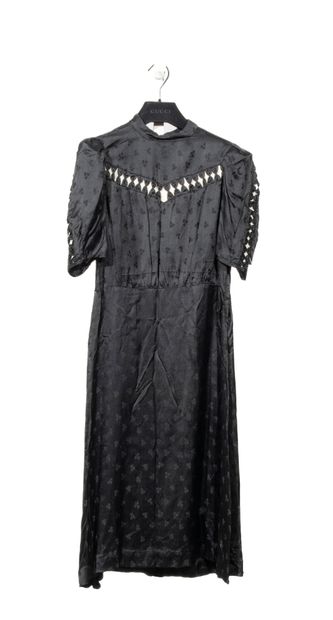 ANONYMOUS, circa 1935 
Dress, black brocaded...